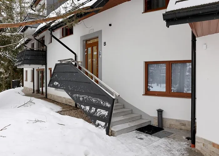 Underground Apartment Bogdańskiego Residence by Renters